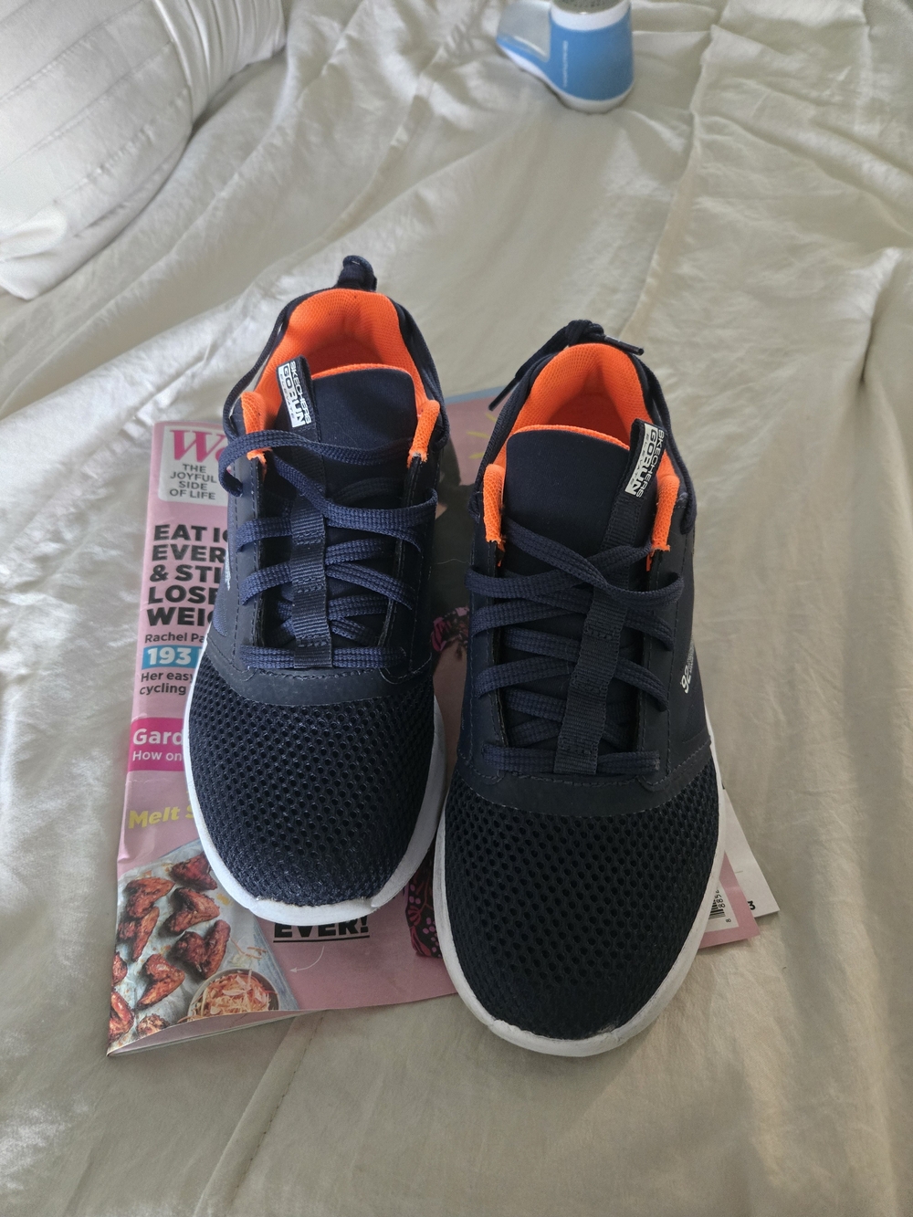Skechers Kids Navy Sneakers with Bright Orange Lining